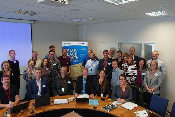 A group od people at conference in an office.